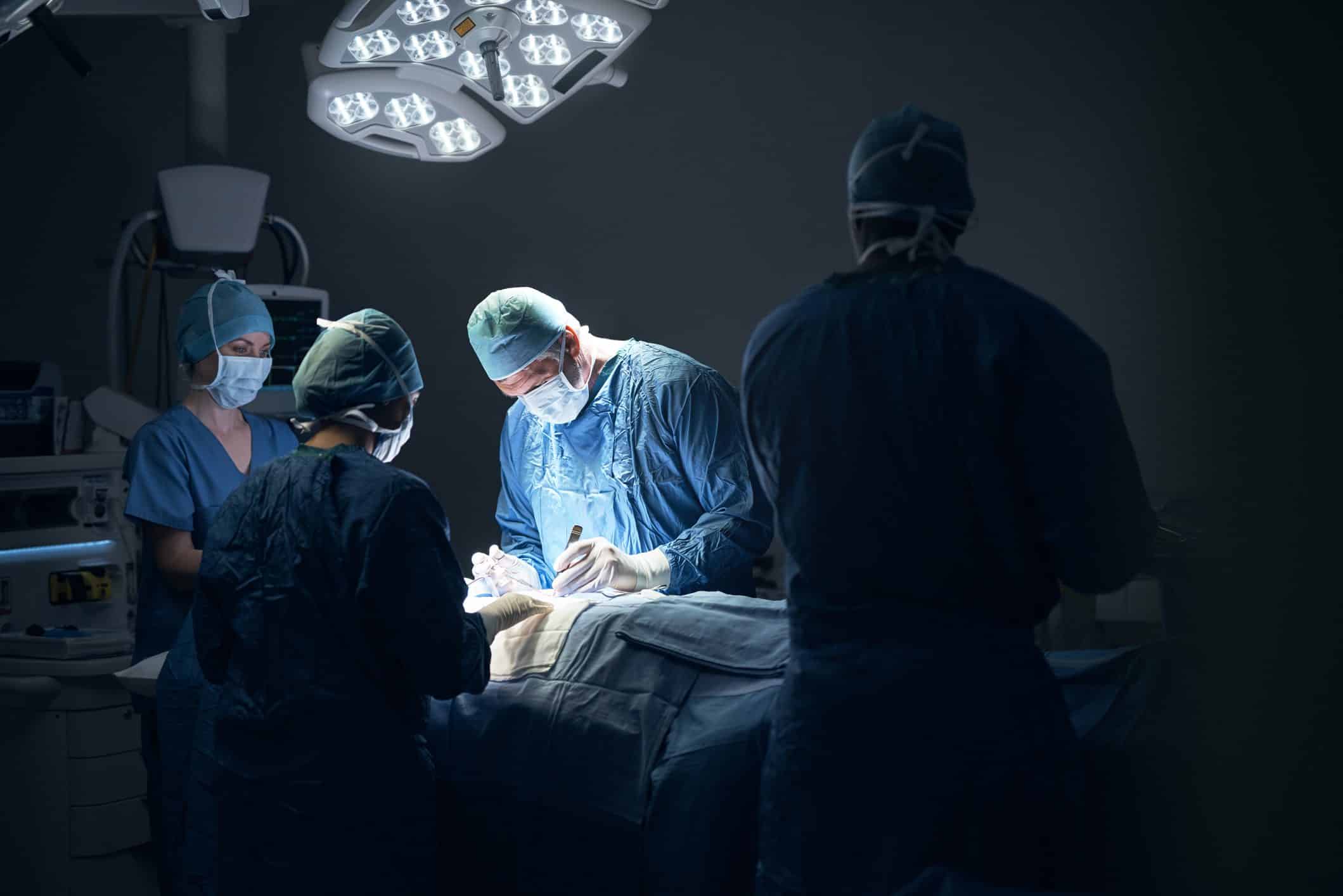 A worker undergoing surgery after an on-the-job injury.