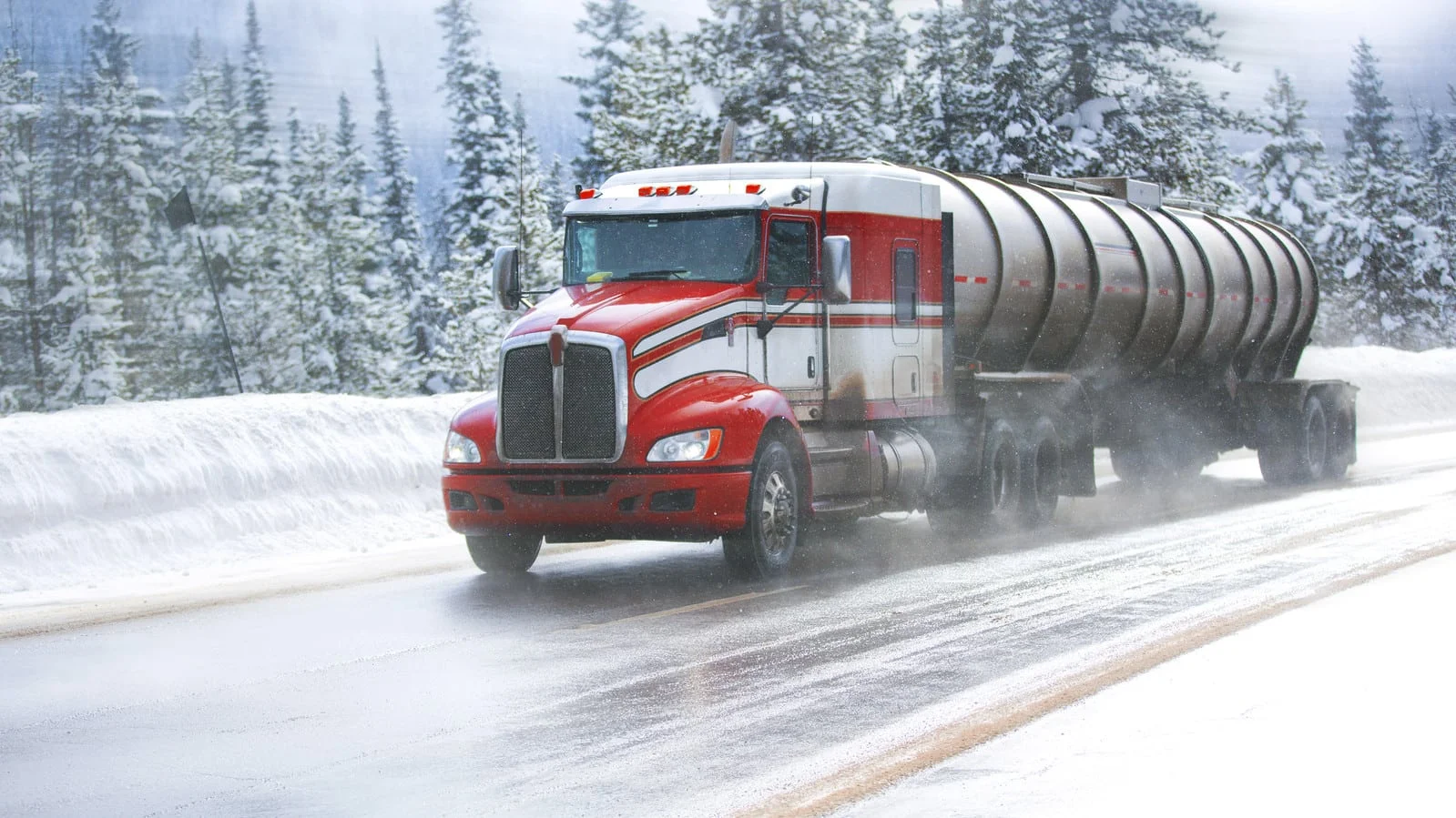 18-wheeler Truck Driving In The Snow